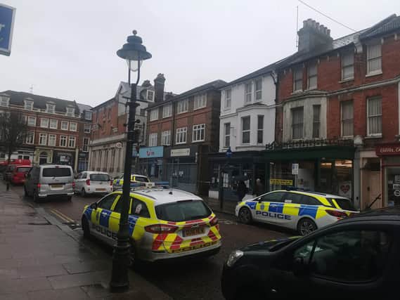 Police have taped off a section of Bexhill town centre. Picture: Andrew Crotty SUS-210218-130306001