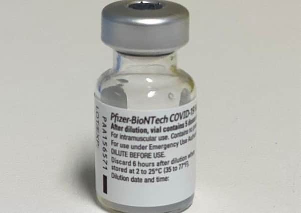 A vial for the first available Covid-19 immunisation, Pfizer-BioNTech’s mRNA vaccine
