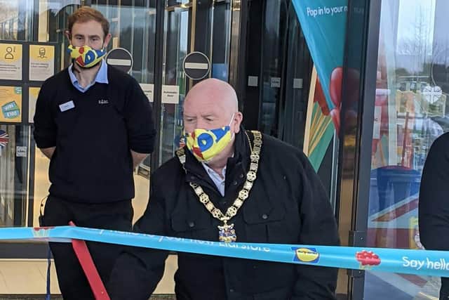 Bognor Regis mayor Phil Woodall cut the ribbon outside the new Lidl store at Oldlands Farm in North Bersted