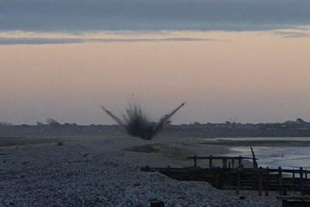 The controlled explosion at the beach SUS-210224-162304001