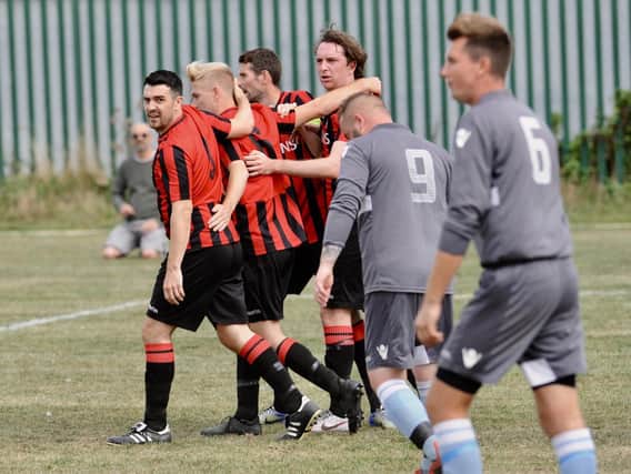Southwick celebrate a goal in their season opener against Ashurst Wood - now could their season still reach a conclusion? Picture: Stephen Goodger