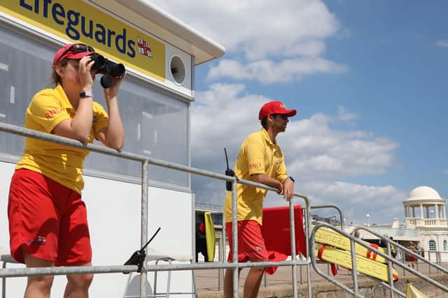 RNLI lifeguards Bexhill-on-Sea  beach July 2020 SUS-210226-183746001