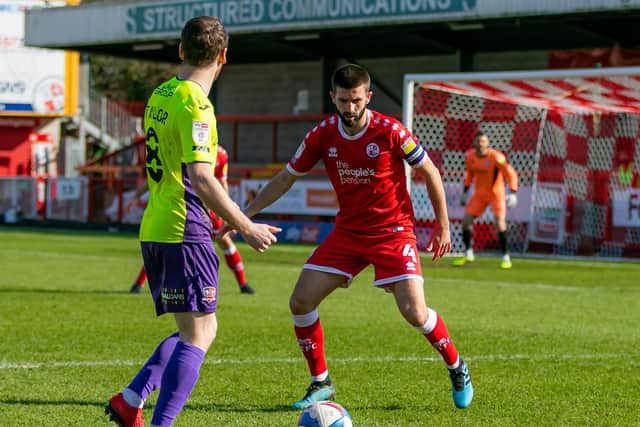 A watchful George Francomb in action against Exeter City. Picture by UK Sports Images Ltd/Jamie Evans