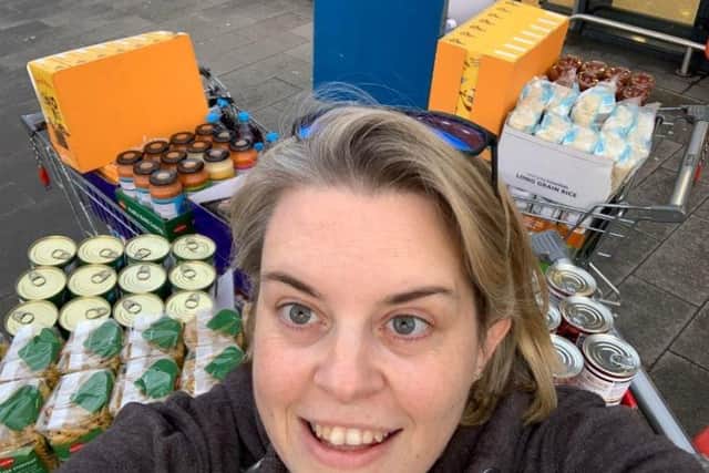 Miss Lindsey Cox, subject leader for health, filled three trolleys for the foodbank at The Angmering School