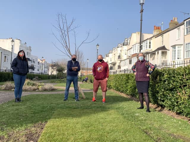 Emilia, Bob, Andy and Ali- residents of The Styene standing over one of the turfed flower beds
