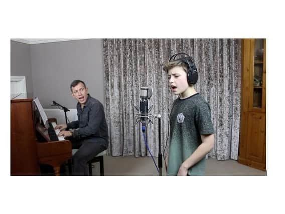 Lancing-based professional singer Dean Ager and his 11-year-old son Sidney