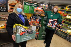 Faye Hersee, new area co-ordinator for Support Our Soldiers, left, with Alison Whitburn, community champion at Morrisons Littlehampton. Picture: Steve Robards SR2103042
