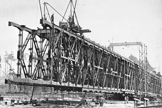 A sectional truss bridge, constructed by the cantilever method