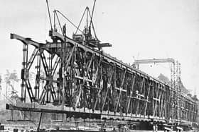 A sectional truss bridge, constructed by the cantilever method