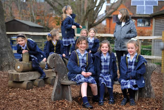 Burgess Hill Girls’ head of prep Heather Cavanagh with pupils. Photo by Steve Robards