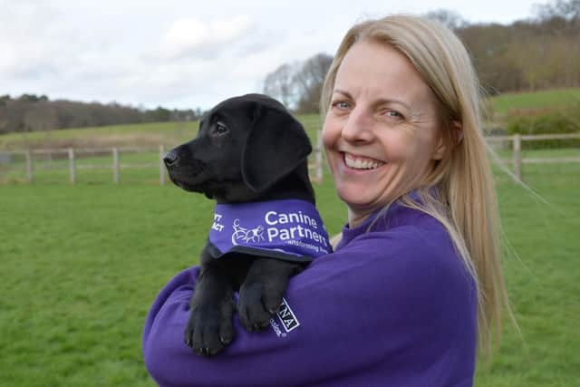 Canine Partners puppy parent Julie Wilks with puppy-in-training Chase