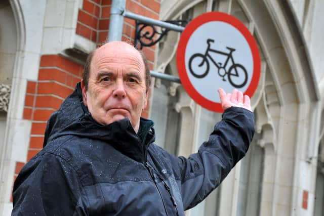 Chris Britton is cross about cyclists who are flouting the no cycling signs in Horsham town centre. Pic Steve Robards SR2103101 SUS-211003-114356001