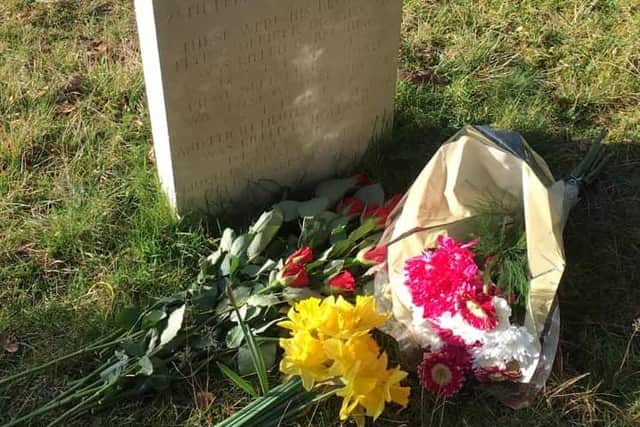 Flowers laid by members of Flashback Midhurst on the anniversary of Flight Lieutenant John Cuthbert Garland's death