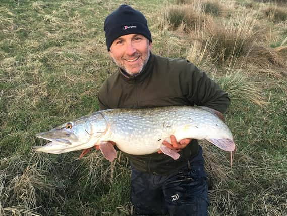 A 20lb pike caught by Colin Smithson, who holds the British record for a barbel