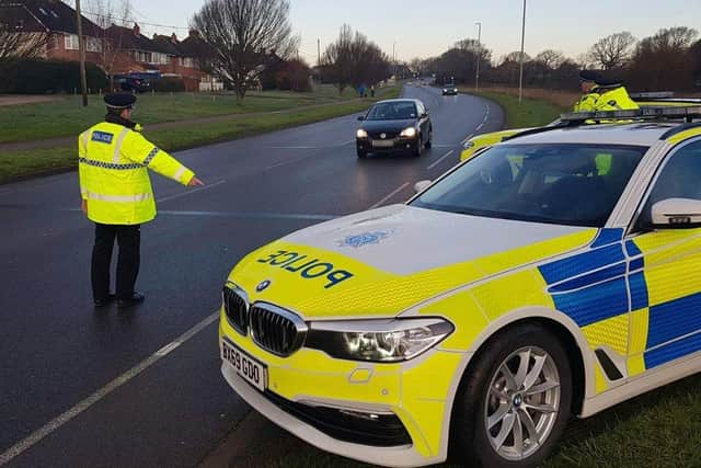 Police carrying out a spot check. Picture from Sussex Police SUS-211103-175324001