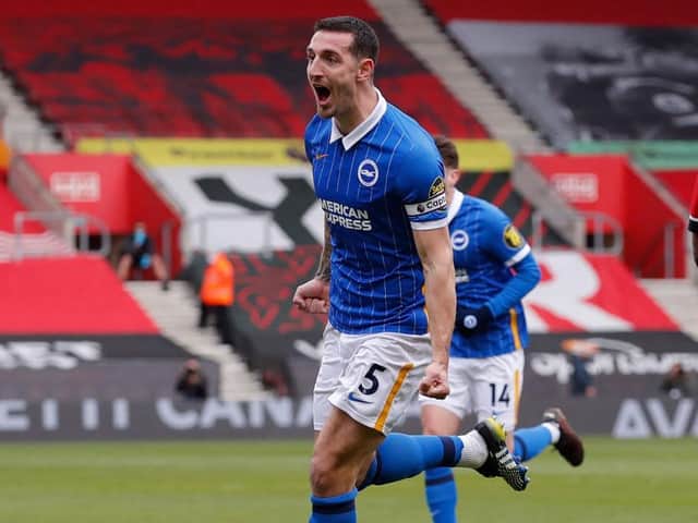 Brighton skipper Lewis Dunk celebrates his thumping header during the 2-1 win at Southampton