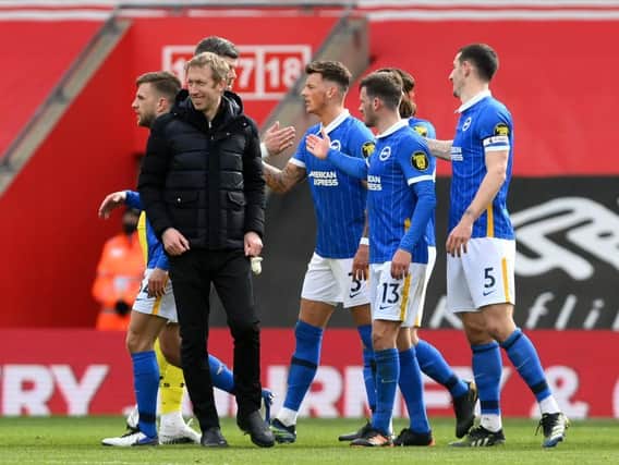 Graham Potter congratulates his players after victory at Southampton