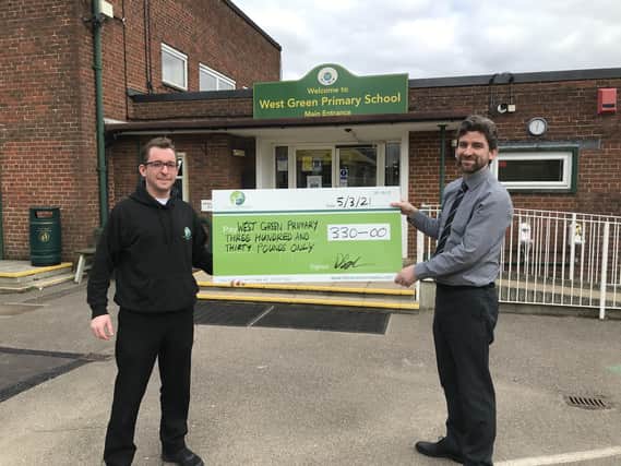Crawley Chiropractic Centre's cheque donation to West Green Primary School SUS-210315-092821001