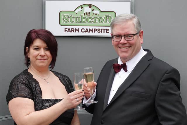 Stubcroft Farm Campsite operations manager Michela Rozborilova and managing director Simon Green celebrate their triple win in the Beautiful South Awards