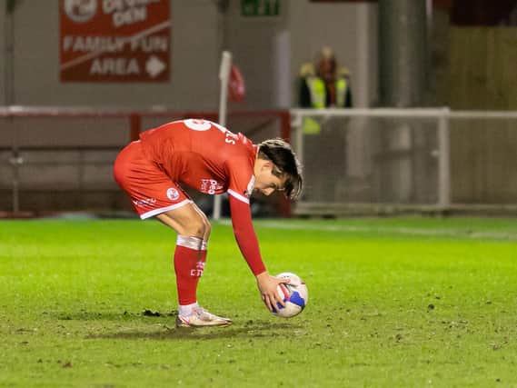 Tom Nichols places the ball before scoring the equaliser. Picture by UK Sports Images Ltd/Jamie Evans