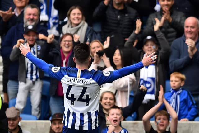 The Brighton striker celebrates in front of the home fans at the Amex after scoring twice against Tottenham last season