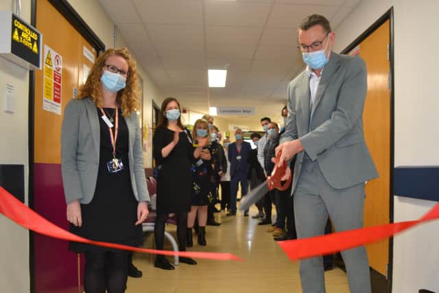 Dr George Findlay, chief medical officer and deputy chief executive, BSUH, with Jemma Deane, lead superintendent radiographer, BSUH; BSUH colleagues from the Imaging Department and Capital Development, and contractors involved in the construction works. Picture: 3Ts Redevelopment