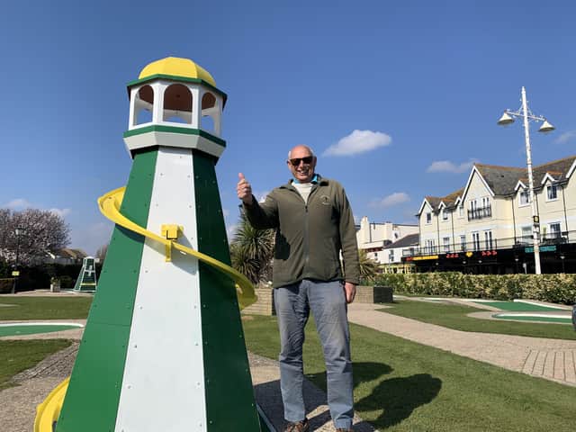Owner Paul Tienan poses with the new helter skelter