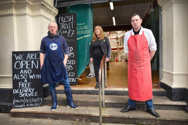 L-R: Paul Saxby (Arcade Fisheries), Pat Horwill (Gifts and Giggles) and Gary Fellows (Arcade Butchers) pictured at the York Gardens entrance to Queens Arcade, Hastings. SUS-210323-110610001