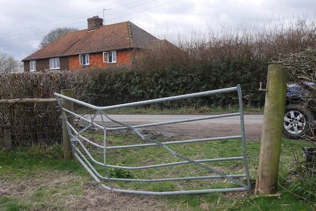 Damage to a gate in the road