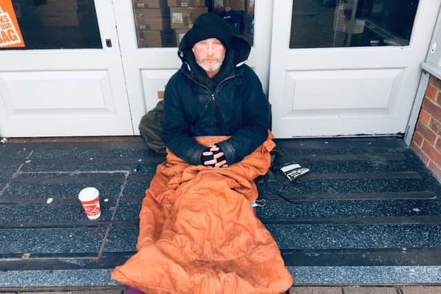 A homeless man in Eastbourne town centre SUS-210323-170616001