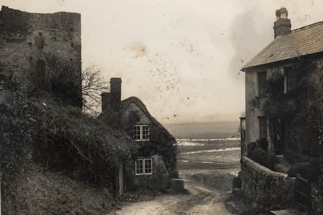 Amberley Castle and the view down to the ferry point at the time of the visit by The Tramp, when the River Arun was in flood