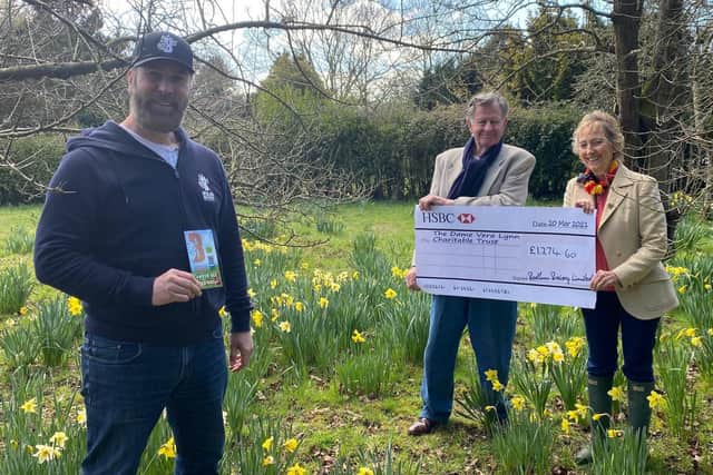 Danny Hoskins, sales director of Bedlam Brewery, presented a cheque for £1,274 to Dame Vera’s daughter Virginia Lewis-Jones and son-in-law Tom on Saturday, March 20. Picture: Bedlam Brewery