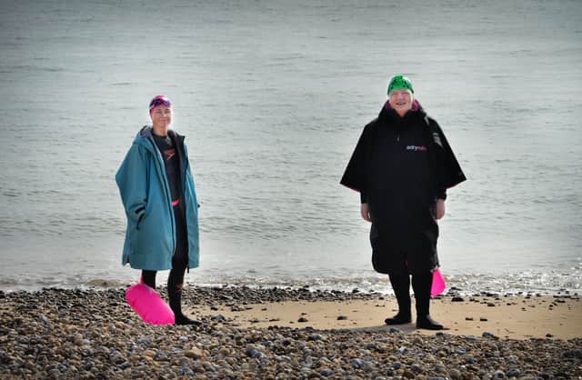 Annemarie Field tries out sea swimming.

Annemarie (right) pictured with Dee Harmer, Sussex Open Water Swimming & Coaching (Fish 2 Water). SUS-210324-130138001
