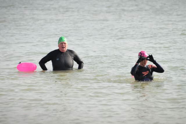 Annemarie Field tries out sea swimming. SUS-210324-130151001