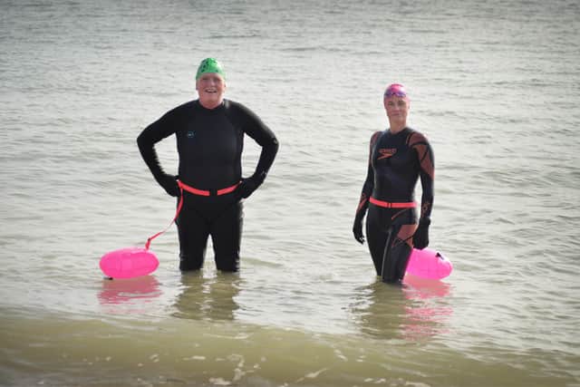 Annemarie Field tries out sea swimming.

Annemarie (left) pictured with Dee Harmer, Sussex Open Water Swimming & Coaching (Fish 2 Water). SUS-210324-130429001