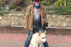 Derek Hill with his dog Bear. SUS-210330-130214001