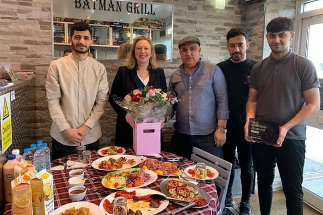 Staff at Batman Grill with MP Sally-Ann Hart in March 2020 after the shop received its award. SUS-201003-093351001