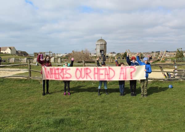 Pupils held a socially-distanced protest in Peacehaven last month