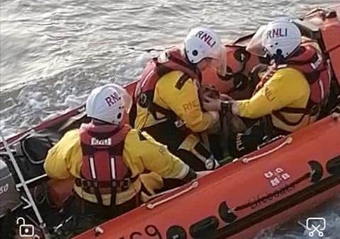 The stranded dog was rescued by the RNLI SUS-210331-161647001