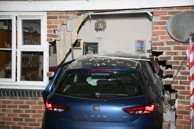 A car crashed into a house in Burgess Hill