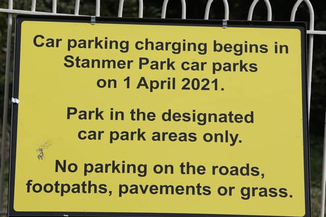 A notice detailing new car parking charges at Stanmer Park SUS-210104-165335001