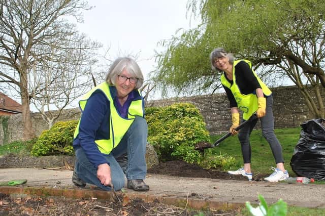 Linda Smith and Marianne Scott, from Chichester Harbour Rotary Club, tidying the flowerbeds in Priory Park