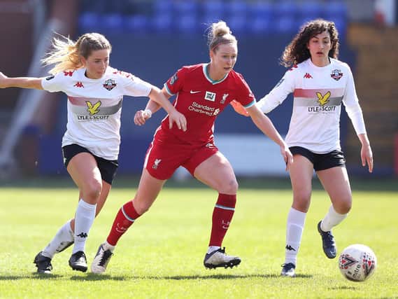 Rhiannon Roberts of Liverpool battles for possession with Filippa Savva and Lucy Ashworth-Clifford of Lewes / Picture: Getty