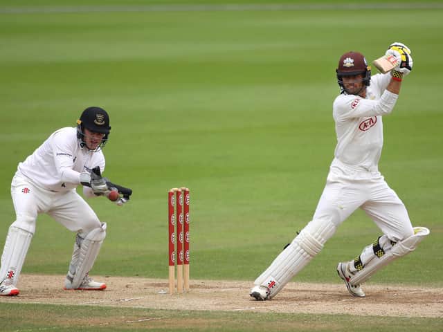 Ben Brown behind the stumps as Ben Foakes hits out / Picture: Getty