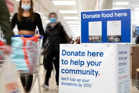 A Tesco food collection point. SUS-210604-163056001