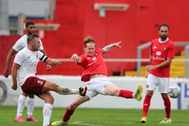Sam Adams fires a shot at goal in the FA Cup tie against Ebbsfleet in October / Picture: Scott White