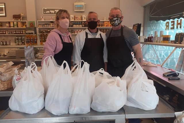 Sarah Gray, owner of The Butcher and Deli in Rustingtin, and her colleague Scott Butler donated hampers of meat and other goodies to Family Support Work