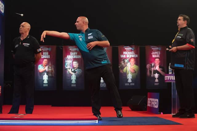 Rob Cross in Premier League darts action / Picture: Lawrence Lustig - PDC