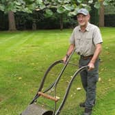 Clive Gravett, curator of the Museum of Gardening at South Downs Nurseries, Hassocks, with a replica of Edwin Beard Buddings' lawn mower. Picture: TBPR