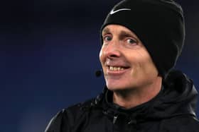 Mike Dean waved away penalty appeals for Brighton at Old Trafford